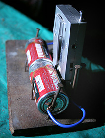 jugaad: mini-radio linked to big batteries with wire